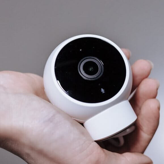 close up view of hand holding camera