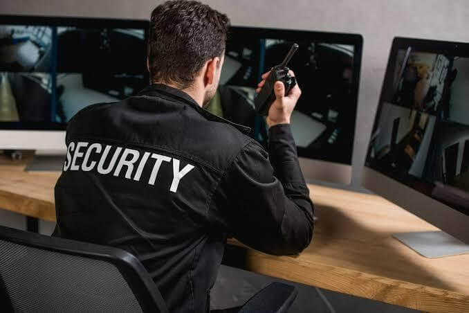 Security guard performing a small business security assessment in Denver